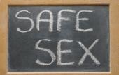 Chalk board with 'Safe sex' written on it